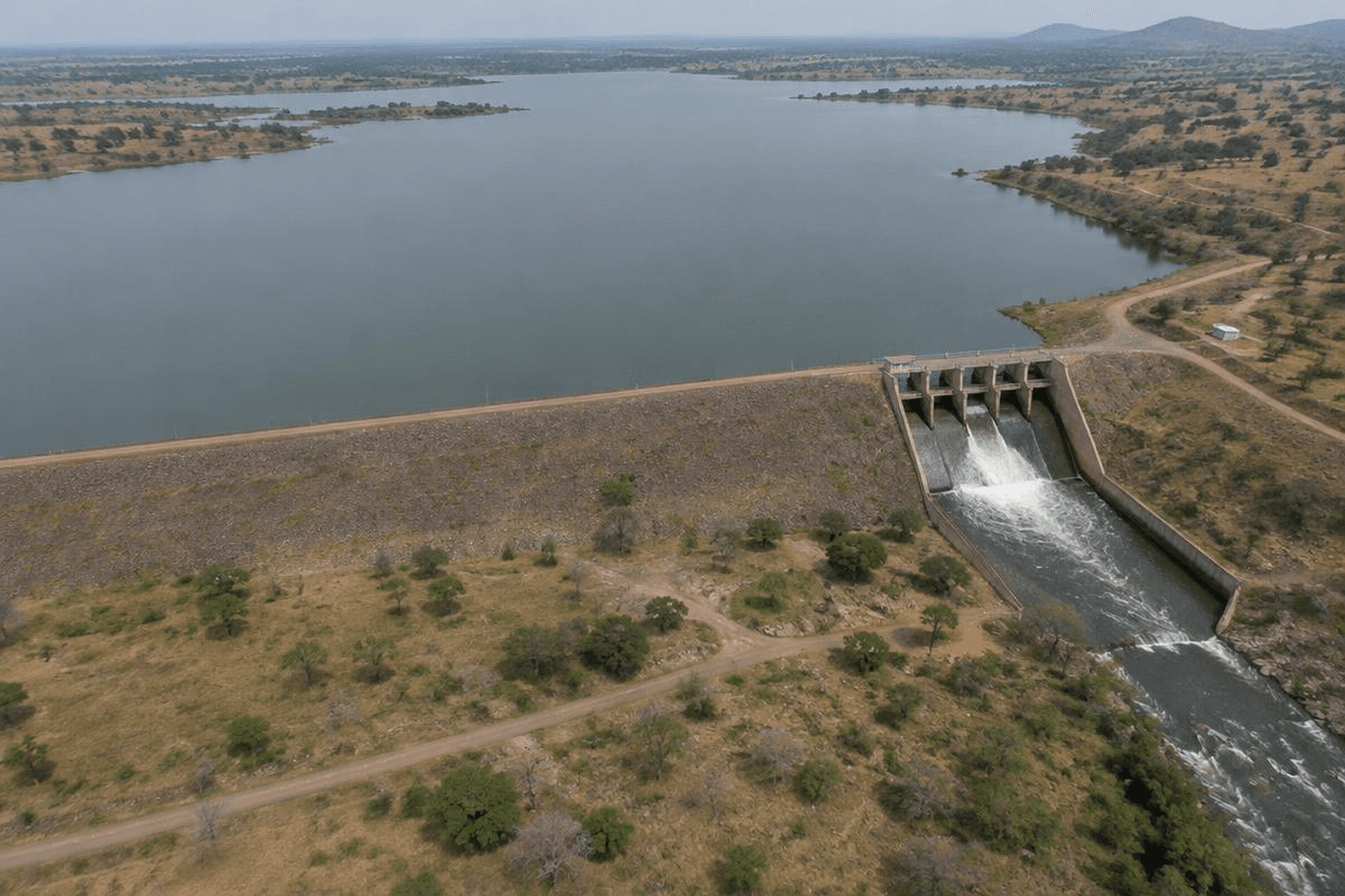 Aerial view of a dam and surrounding landscape